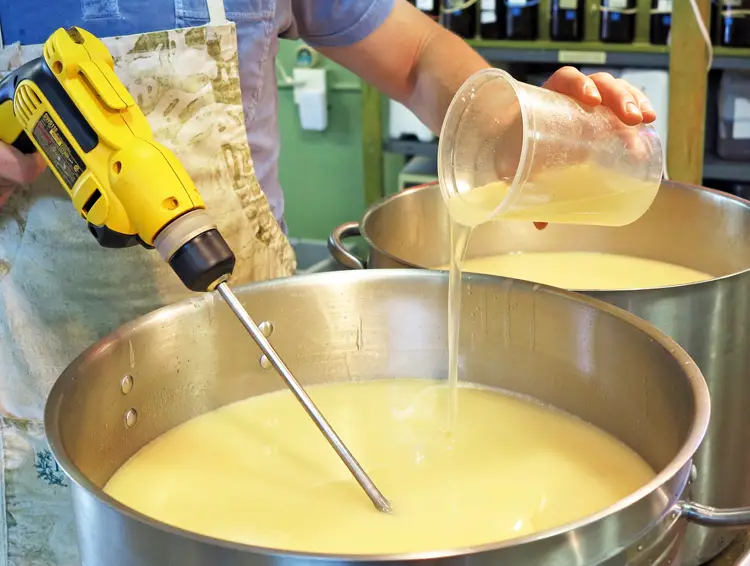 Handcrafting cold-process natural soap in large stainless steel pots