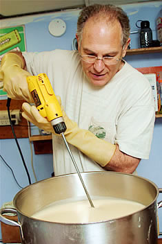 Ken Gilberg making herbaria all natural soaps by hand