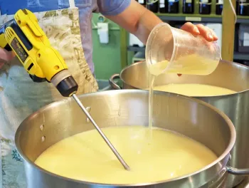 Handcrafting cold-process natural soap in large stainless steel pots