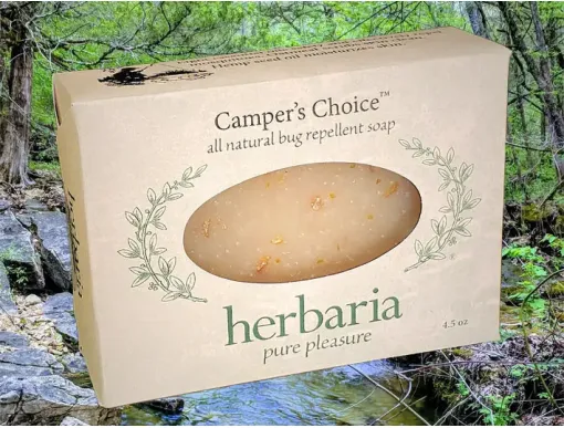 A bar of Camper's Choice bug repellent soap by Herbaria featuring natural essential oils and eco-friendly packaging.