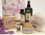 Herbaria Lavender Gift Set with 6 all-natural lavender bath products in a purple floral paper-wrapped box.
