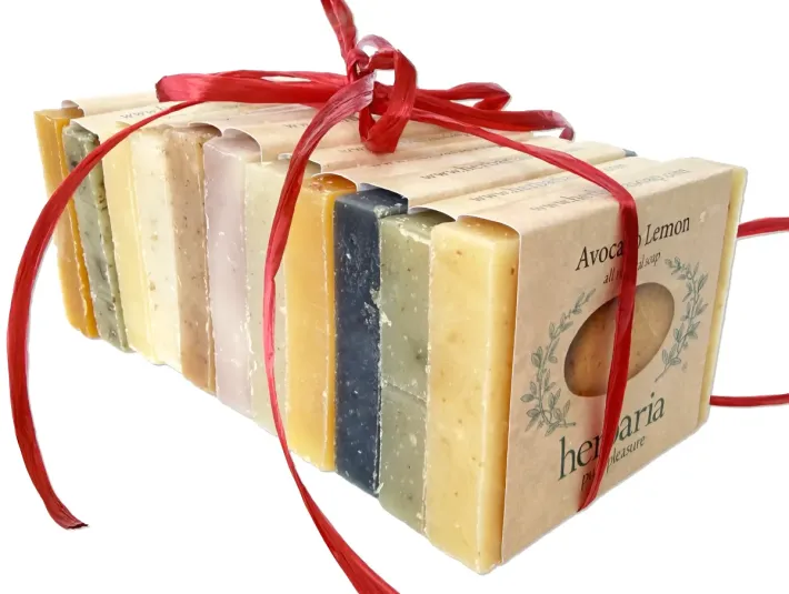 Herbaria's best selling cutie sample sized bars all wrapped up in a red bow together.