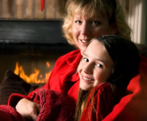 woman and daughter fireside photo